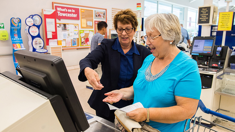Staff member helping shopper