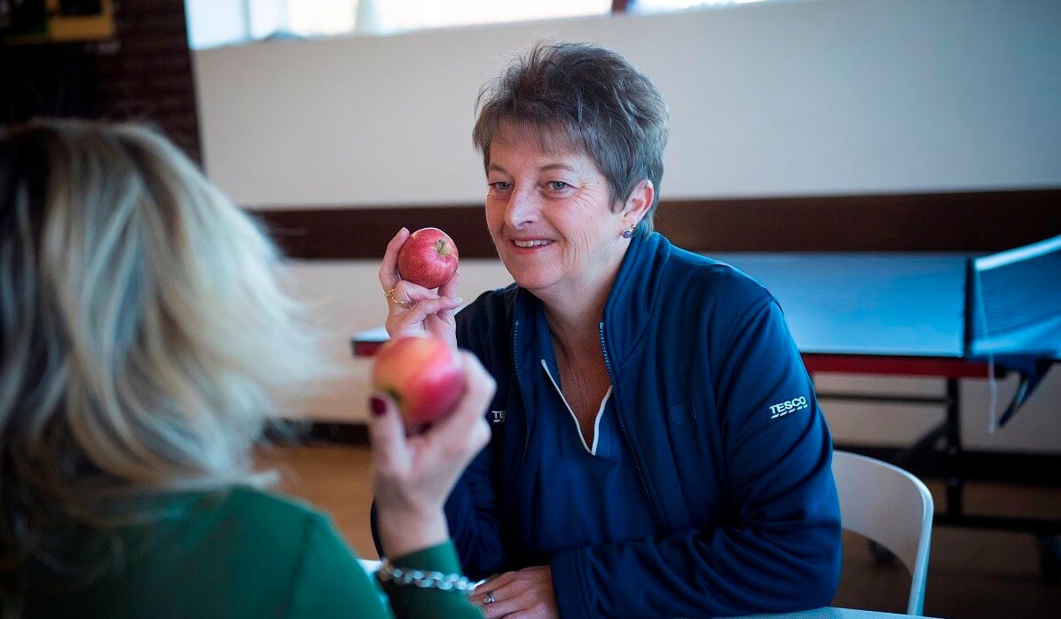 Woman eating an apple